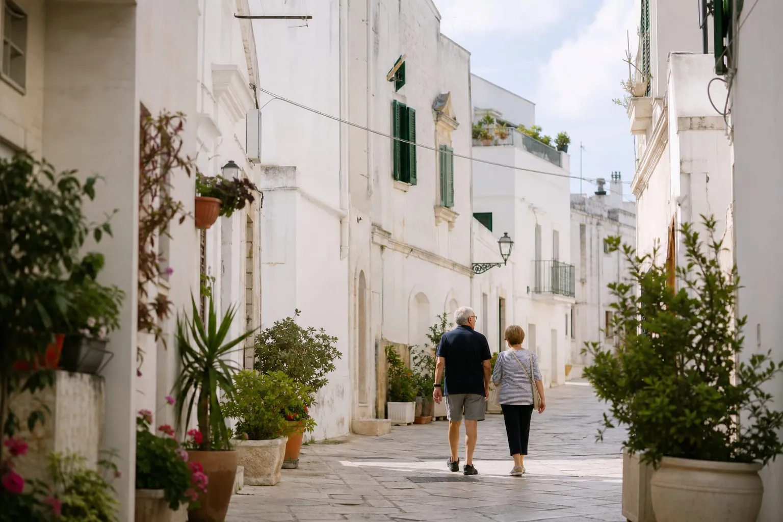 TODO: describe what is visible, e.g. "a whitewashed old-town street in a small town in Puglia"